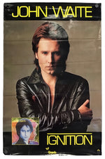 A vintage John Waite 'Ignition' album poster print, featuring a portrait of the artist in a black leather jacket against a dark background with bold yellow text.