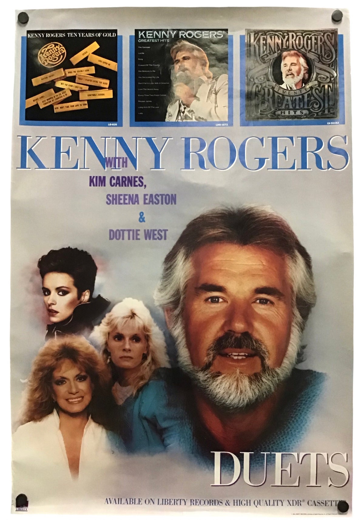 A vintage-style Kenny Rogers 'Duets' poster or print featuring portraits of Kenney Rogers, Kim Carnes, Sheena Easton, and Dottie West, with three album-cover style panels across the top and large blue title text reading 'KENNY ROGERS' and 'DUETS'.