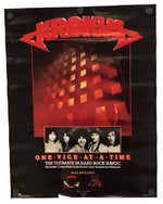 A vintage-style Krokus band poster or print with a black background, large red logo at the top, a red illuminated building graphic in the center, a small band photo strip, and orange text near the bottom.