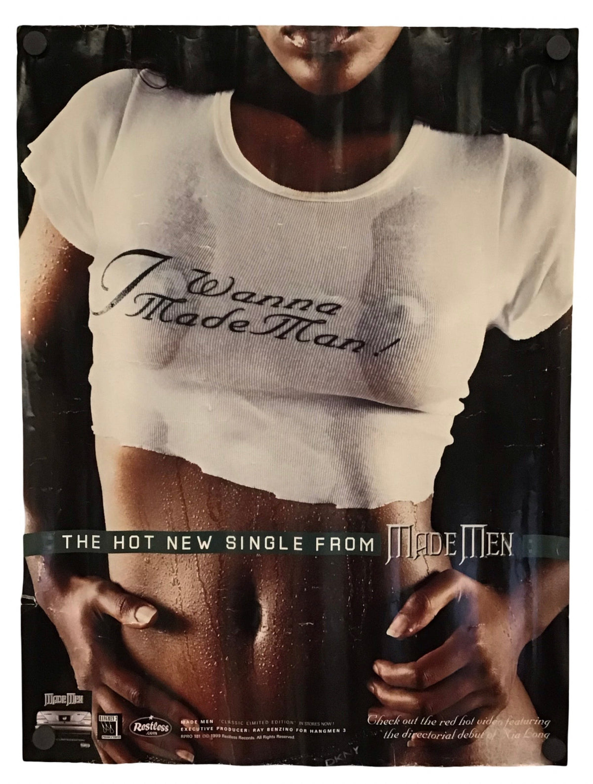 A vintage music poster for Made Men's 'I Wanna Made Man!' featuring a cropped photo of a woman in a white graphic t-shirt, with the text 'THE HOT NEW SINGLE FROM MADE MEN' across the bottom.