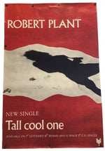 A vintage-style poster or print featuring the text 'ROBERT PLANT' and 'Tall cool one' on a red background with a cream and black abstract landscape graphic.