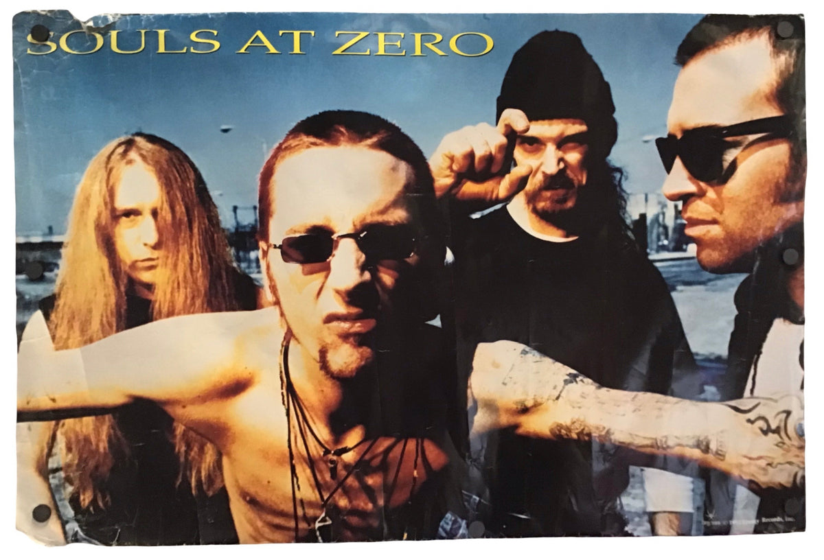A square printed poster or album-cover style print featuring the band name 'SOULS AT ZERO' at the top and a group portrait of four men against a blue sky background, shown against a plain white backdrop.