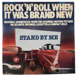 Vintage album cover for 'Rock 'N' Roll When It Was Brand New' from the Columbia motion picture 'Stand By Me', featuring two classic cars facing a movie screen, with cream text on a dark blue background.
