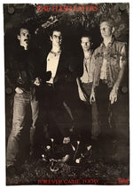 A vintage band poster for 'The Flesh Lovers' featuring a black and white photograph of four men standing outdoors, with red text at the top and bottom reading 'THE FLESH LOVERS' and 'FOREVER COME TODAY'.